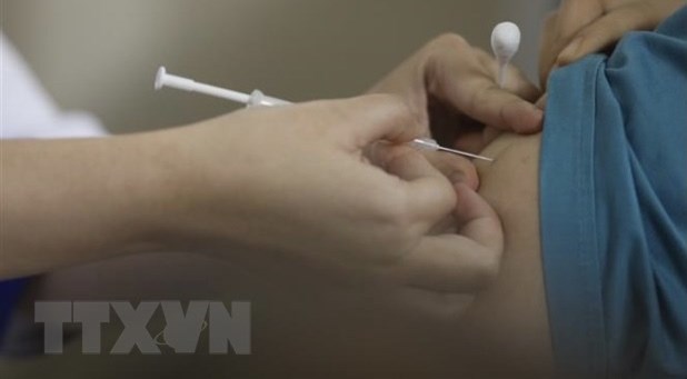 越南卫生部加快新冠疫苗接种进度 hinh anh 1