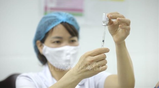 卫生部长阮青龙：将保障新冠疫苗接种安全置于首要位置 hinh anh 2