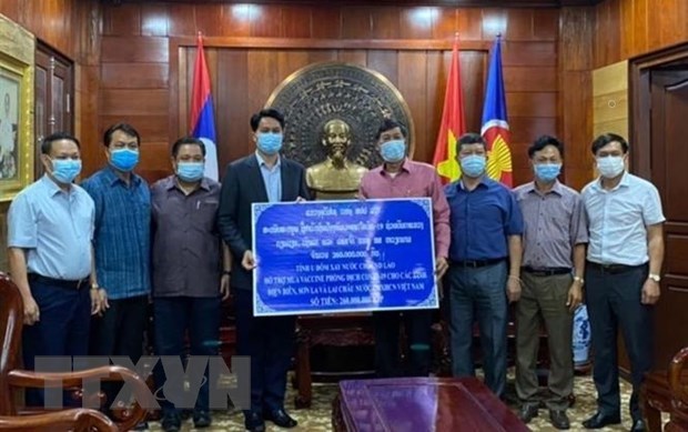 老挝为越南新冠肺炎疫情防控提供援助 hinh anh 1