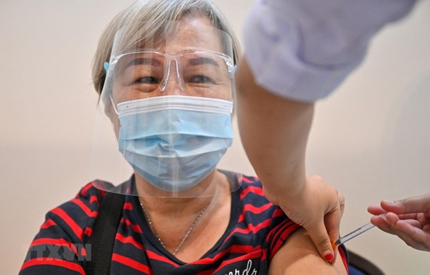 新冠肺炎疫情：马来西亚坚决实现群体免疫目标 hinh anh 1