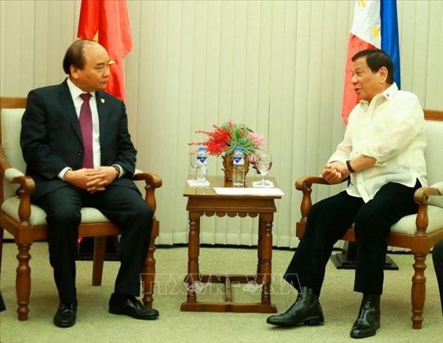 越南领导人致电菲律宾领导庆祝两国建交45周年 hinh anh 1