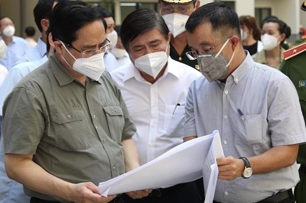 范明政总理：从现在到月底将有至少200万剂新冠疫苗到达胡志明市 hinh anh 2