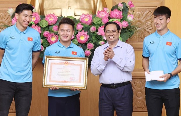 政府总理范明政：体育有助于加强民族大团结 展现越南人意志和毅力 hinh anh 1