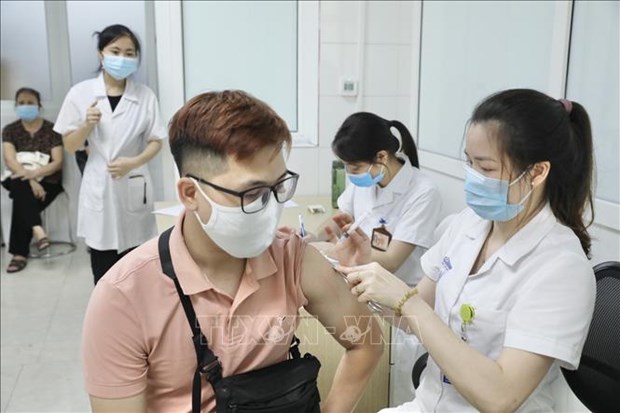 新冠疫苗Nano Covax三期人体临床试验的1.3万名志愿者完成第一针接种 hinh anh 1