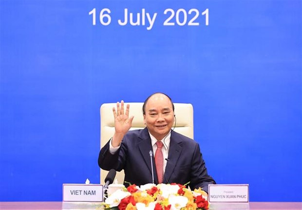 越南国家主席阮春福在河内以视频方式出席亚太经合组织领导人非正式会议 hinh anh 2