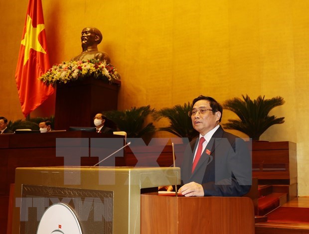 越南第十五届国会第一次会议：政府总理向国会提交新一届政府的组织方案 hinh anh 1
