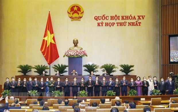 越南第十五届国会第一次会议：批准任命18位部长和4名政府成员 hinh anh 1