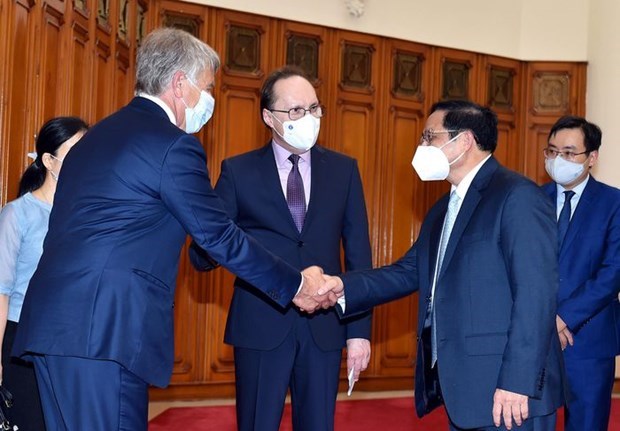 越南政府总理范明政会见俄罗斯驻越大使贝兹德科 hinh anh 1