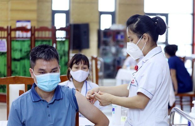谅山、老街、清化三省积极开展新冠疫苗接种计划 hinh anh 1