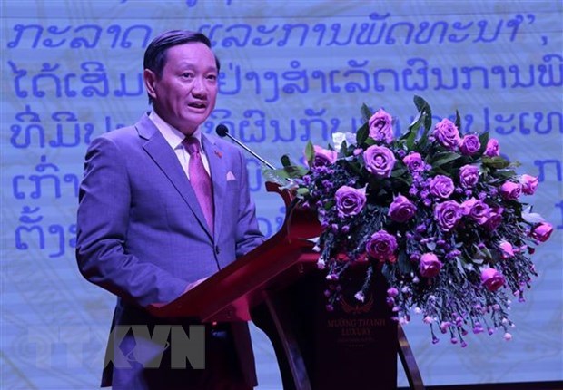 越南驻老挝大使祝贺老挝新闻日71周年 hinh anh 1