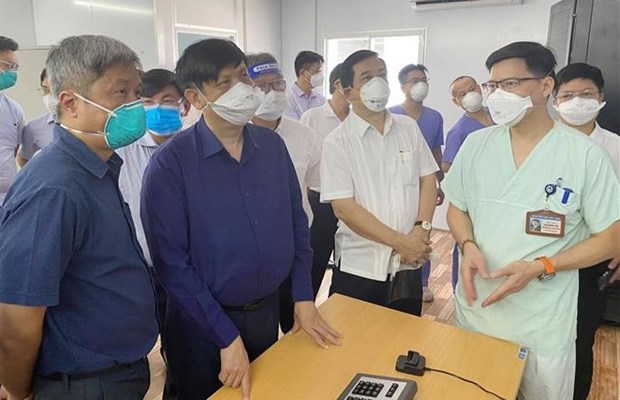胡志明市将新冠肺炎患者收治模式从 “5层”转为 “3层” hinh anh 1