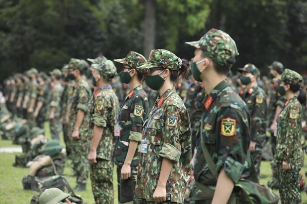 越南国防部部长：军队下定决心 使用一切办法 动用一切资源支援南方各地应对疫情 hinh anh 1