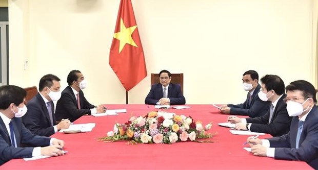越南政府总理范明政与比利时总理德克鲁举行电话会谈 hinh anh 1