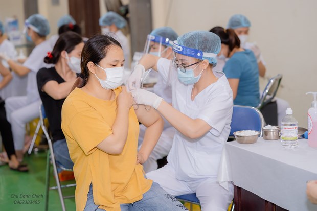 越南全国新冠疫苗接种剂次已超3040万 hinh anh 3