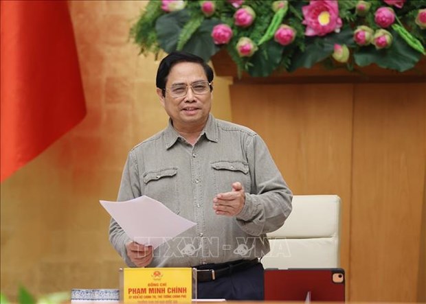 越南政府总理范明政：研究安全、灵活适应和有效控制疫情措施 hinh anh 2
