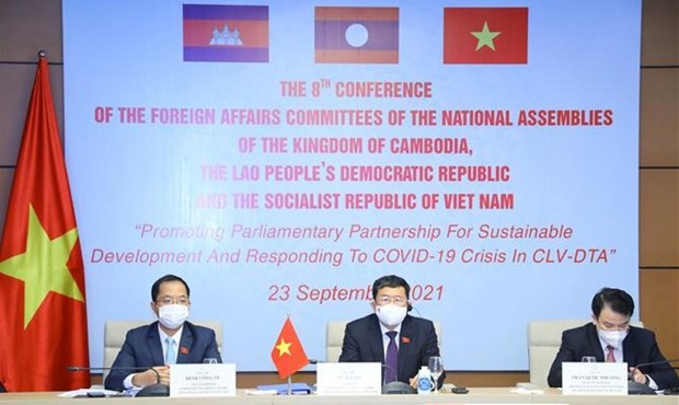 越老柬三国国会对外委员会关于发展三角区的第八次会议开幕 hinh anh 1