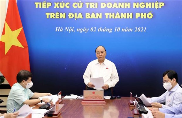 国家主席阮春福与胡志明市企业选民接触 hinh anh 1