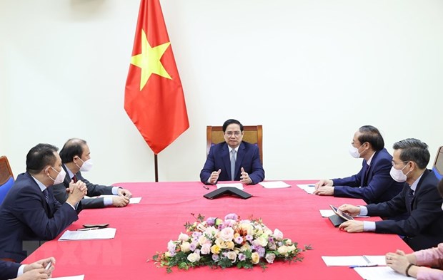 越南政府总理范明政与美国总统气候特使克里通电话 hinh anh 2