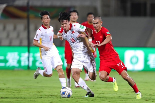 世界杯亚洲区预选赛12强赛：中国队以3比2击败越南队 hinh anh 1