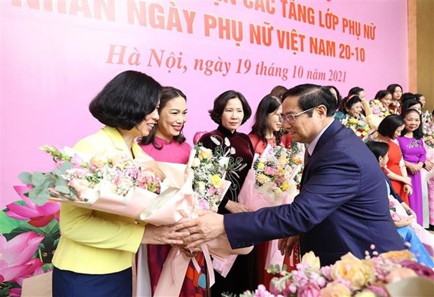 范明政：越南为妇女营造了发挥自己作用和为社会贡献力量的环境 hinh anh 1