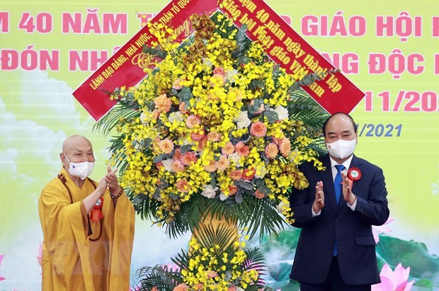 国家主席阮春福：越南佛教协会继续发挥其在加强民族大团结、宗教团结中的作用 hinh anh 1