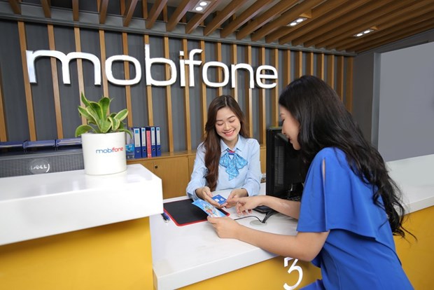 MobiFone成为越南首家试点提供移动支付服务的电信运营商 hinh anh 1