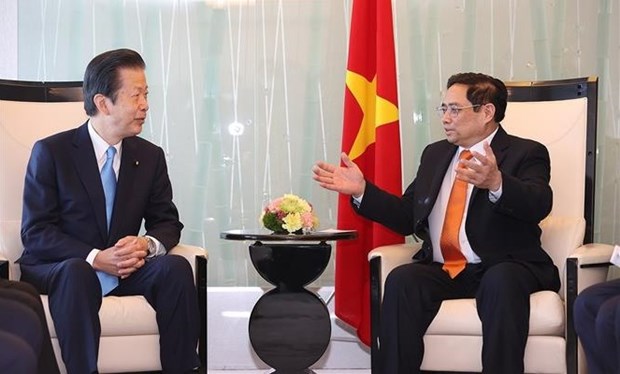 越南政府总理范明政会见日本共产党和公明党领导 hinh anh 2