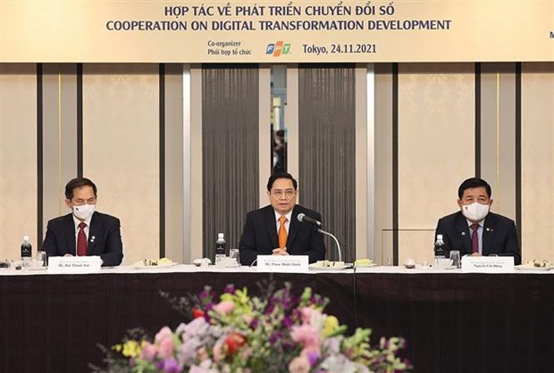 越南政府总理范明政与日本数字化转型大型集团领导人进行交谈 hinh anh 2