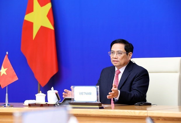 越南政府总理范明政就加强亚欧各国合作提出四项建议 hinh anh 1