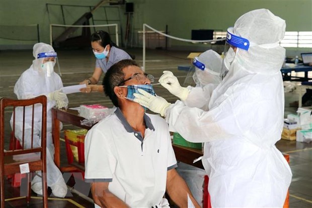 11月30日越南62个省市新增新冠肺炎确诊病例近1.4万例 hinh anh 1