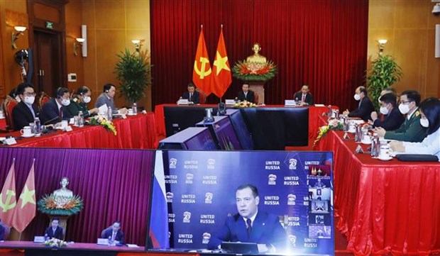 越南共产党代表团出席国际政党多边视频会议 hinh anh 2