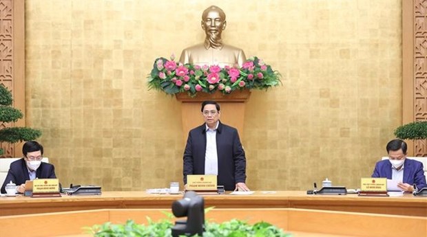 范明政总理：要坚持实施“安全、灵活地适应和有效控制疫情”的政策 hinh anh 1