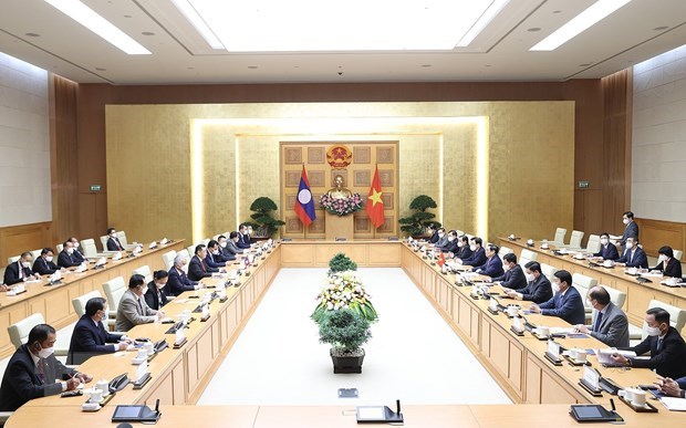 越南政府总理范明政会见老挝国会主席赛宋蓬·丰威汉 hinh anh 2