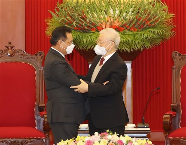 越共中央总书记阮富仲会见老挝国会主席赛宋蓬·丰威汉 hinh anh 1