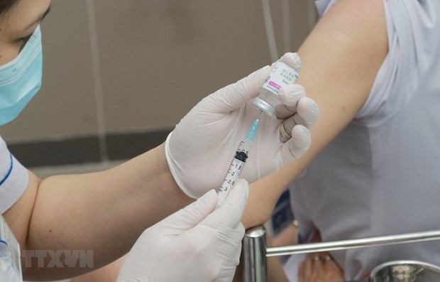 胡志明市于12月10日正式启动第三剂次新冠疫苗接种工作 hinh anh 1