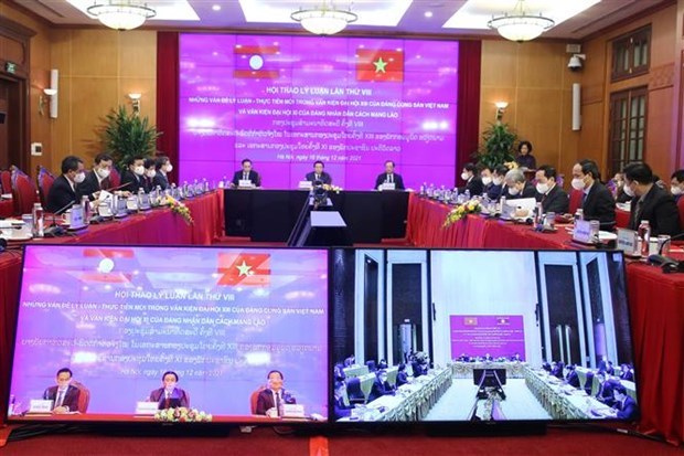 越南共产党与老挝人民革命党第八次理论研讨会以视频形式召开 hinh anh 1