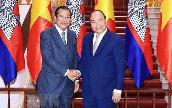 越南国家主席阮春福访问柬埔寨：推动越柬关系走向深入和务实 hinh anh 1