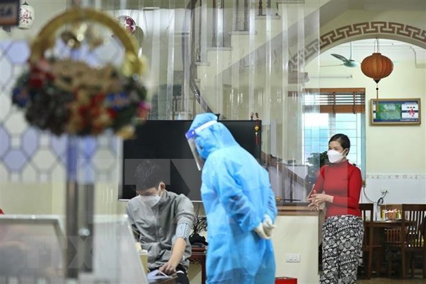 越南全国报告新增确诊病例16157例 新增治愈病例近3.1万例 hinh anh 1