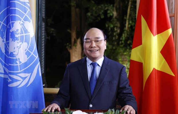 国家主席阮春福：越南自信和愿承担更多国际重任 hinh anh 1