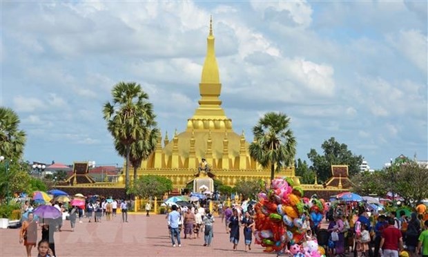 老挝为从明年1月1日起重开国门迎接外国游客做好准备 hinh anh 1