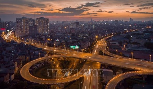 世行驻越首席经济专家：2022年越南经济增长率达6~6.5%的目标完全可以实现 hinh anh 1
