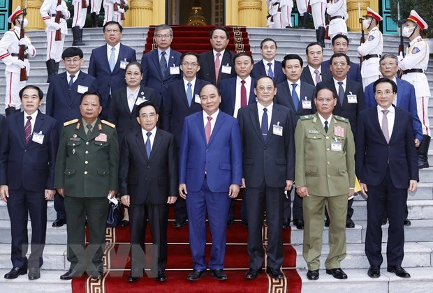 越南国家主席阮春福会见老挝总理潘坎·维帕万 hinh anh 2