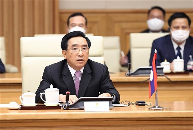越南政府总理范明政与老挝政府总理潘坎·维帕万举行会谈 hinh anh 2