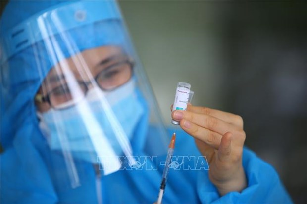 越南卫生部要求加快新冠疫苗接种进度 hinh anh 1