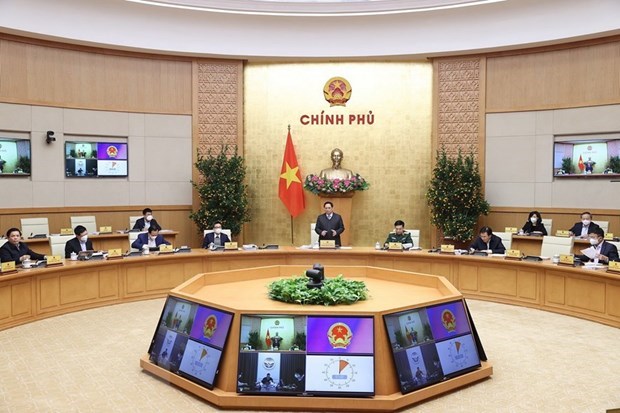 越南政府总理主持召开2022年1月份政府关于法律建设专题会议 hinh anh 1