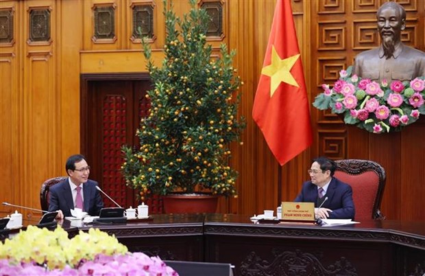 政府总理范明政欢迎三星扩大在越南投资规模 hinh anh 1