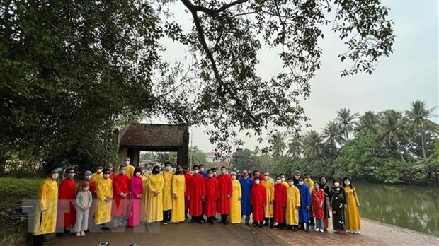 多国驻越大使和和国际组织代表体验传统春节活动在河内市举行 hinh anh 2