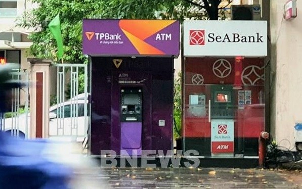 春节将至ATM取款机略显“落寞”而银行APP则“拥挤”不堪 hinh anh 1
