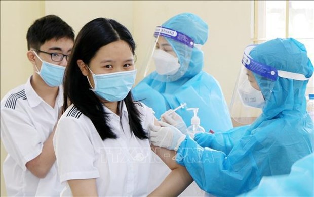 越南12至17岁人群新冠疫苗第二剂接种覆盖率已达89.7% hinh anh 1