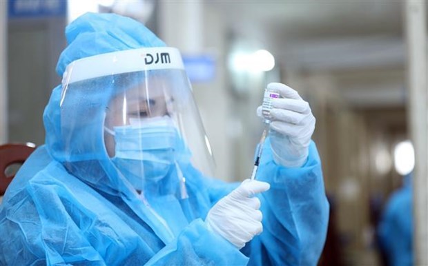 越南政府总理范明政就新冠疫苗接种和推进疫情防控工作作出重要指示 hinh anh 1